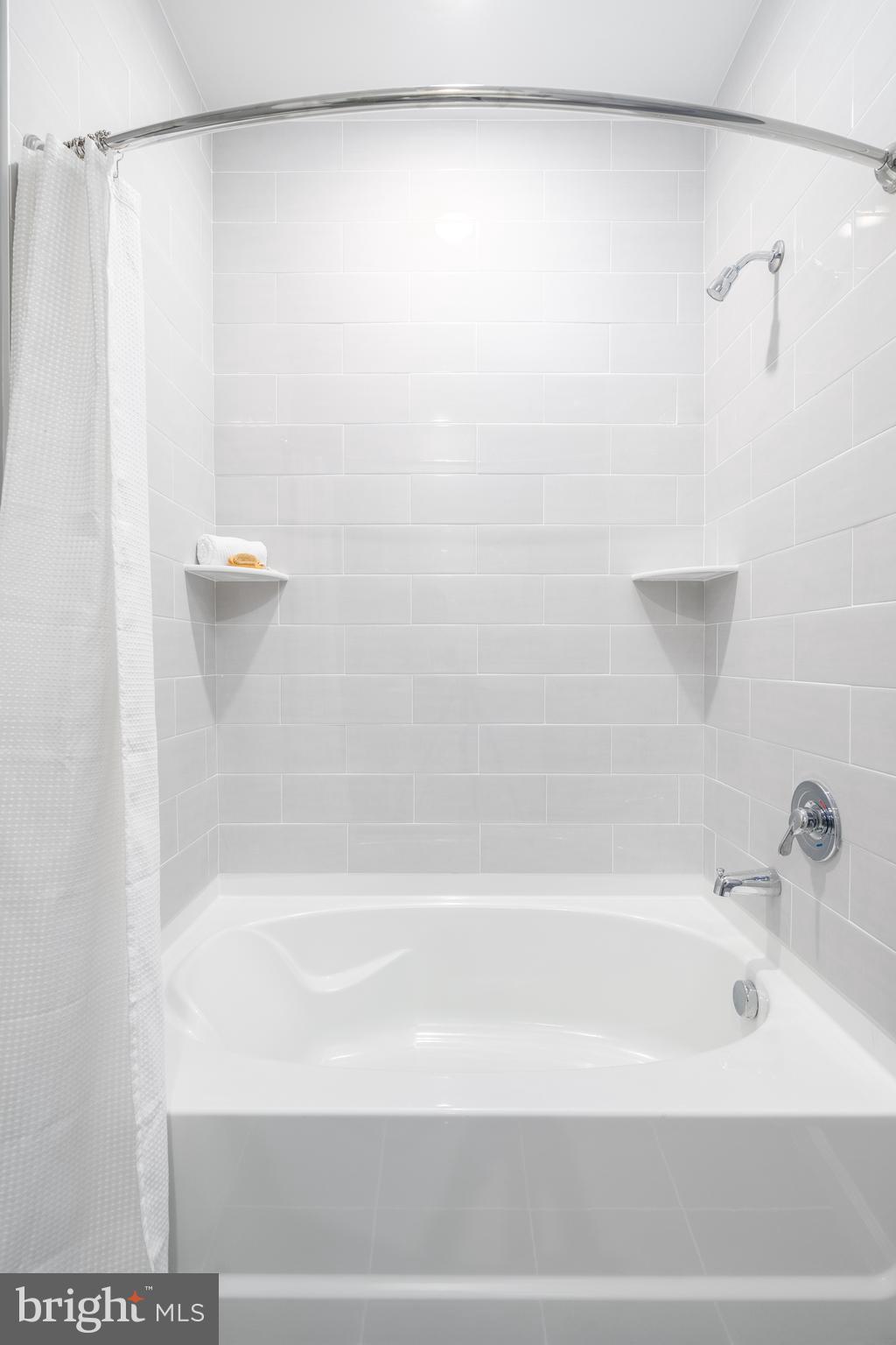 700 Citation Lane, Unit 1011 Cherry Hill, NJ 08002 - Photo 29 of 33 a bathroom with a shower and a bath tub