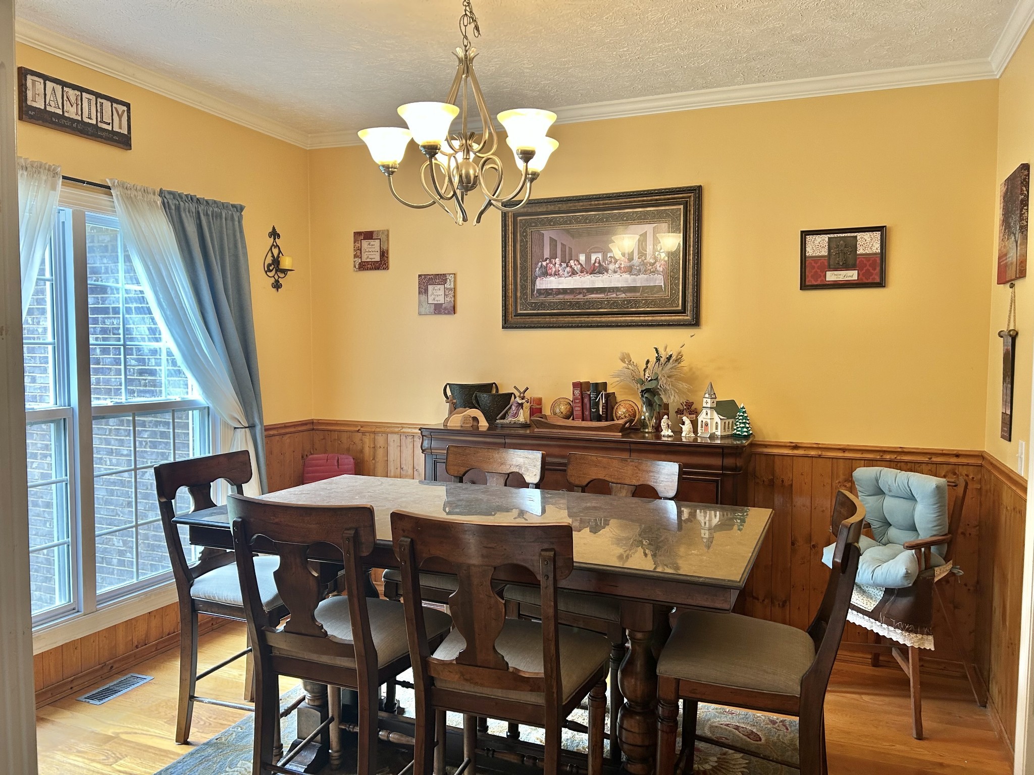 83 Rutledge Falls Road Tullahoma, TN 37388 - Photo 14 of 25 a view of a dining room with furniture and wooden floor
