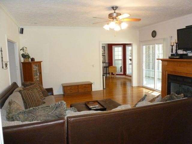 83 Rutledge Falls Road Tullahoma, TN 37388 - Photo 9 of 25 a living room with furniture and a fireplace