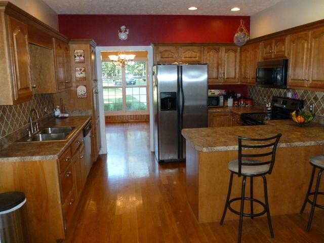 83 Rutledge Falls Road Tullahoma, TN 37388 - Photo 10 of 25 a kitchen with stainless steel appliances granite countertop a refrigerator a stove top oven a sink and dishwasher