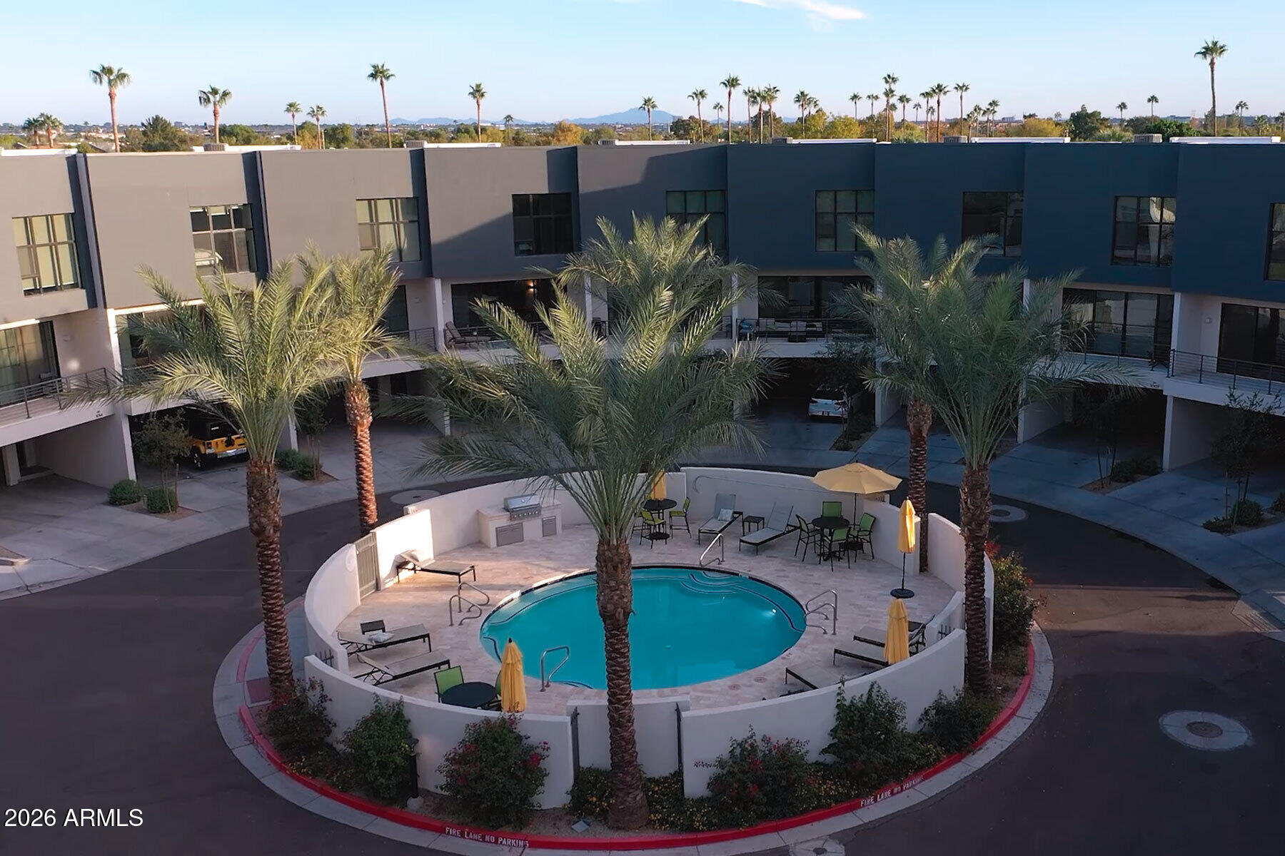 1401 North Granite Reef Road, Unit 1019 Scottsdale, AZ 85257 - Photo 3 of 6 a view of a chairs and table in patio