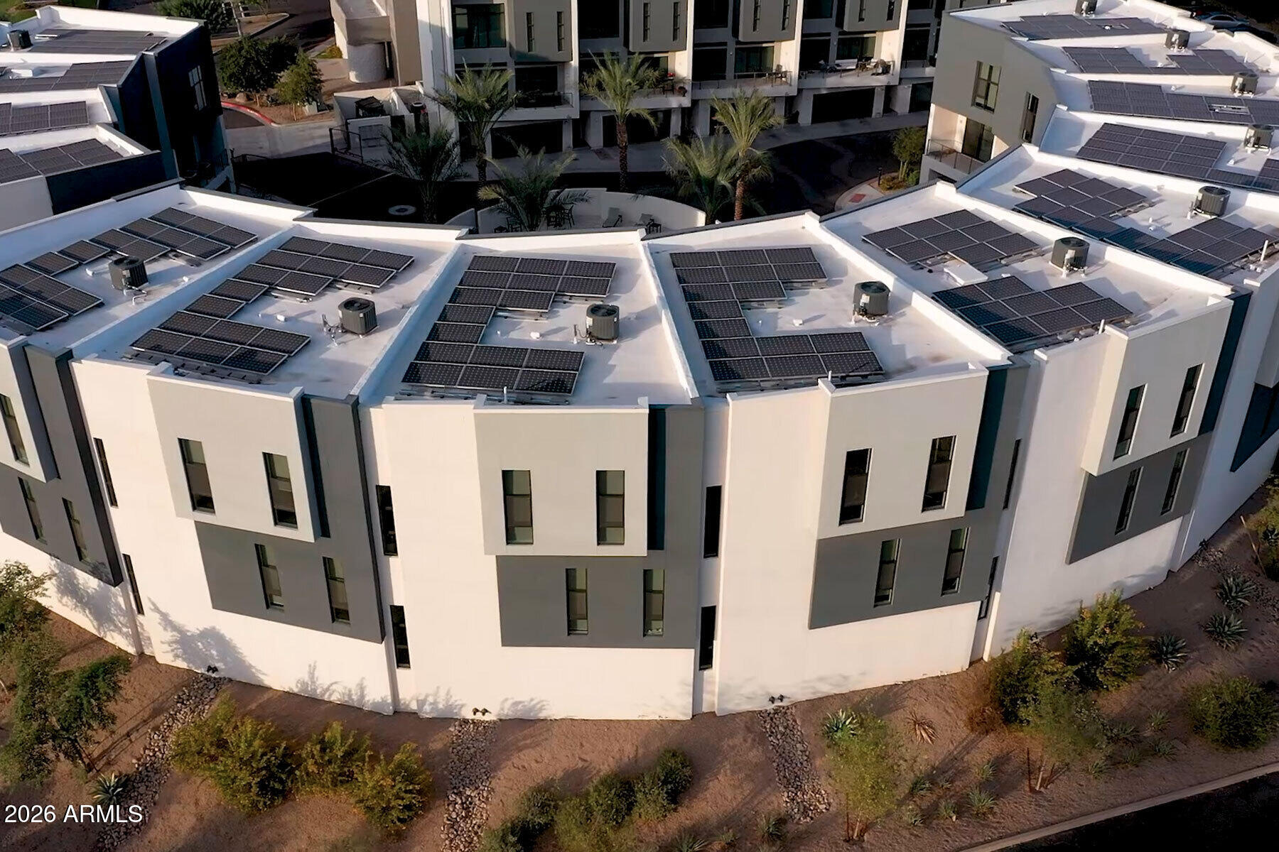 1401 North Granite Reef Road, Unit 1019 Scottsdale, AZ 85257 - Photo 6 of 6 a view of a building with many windows