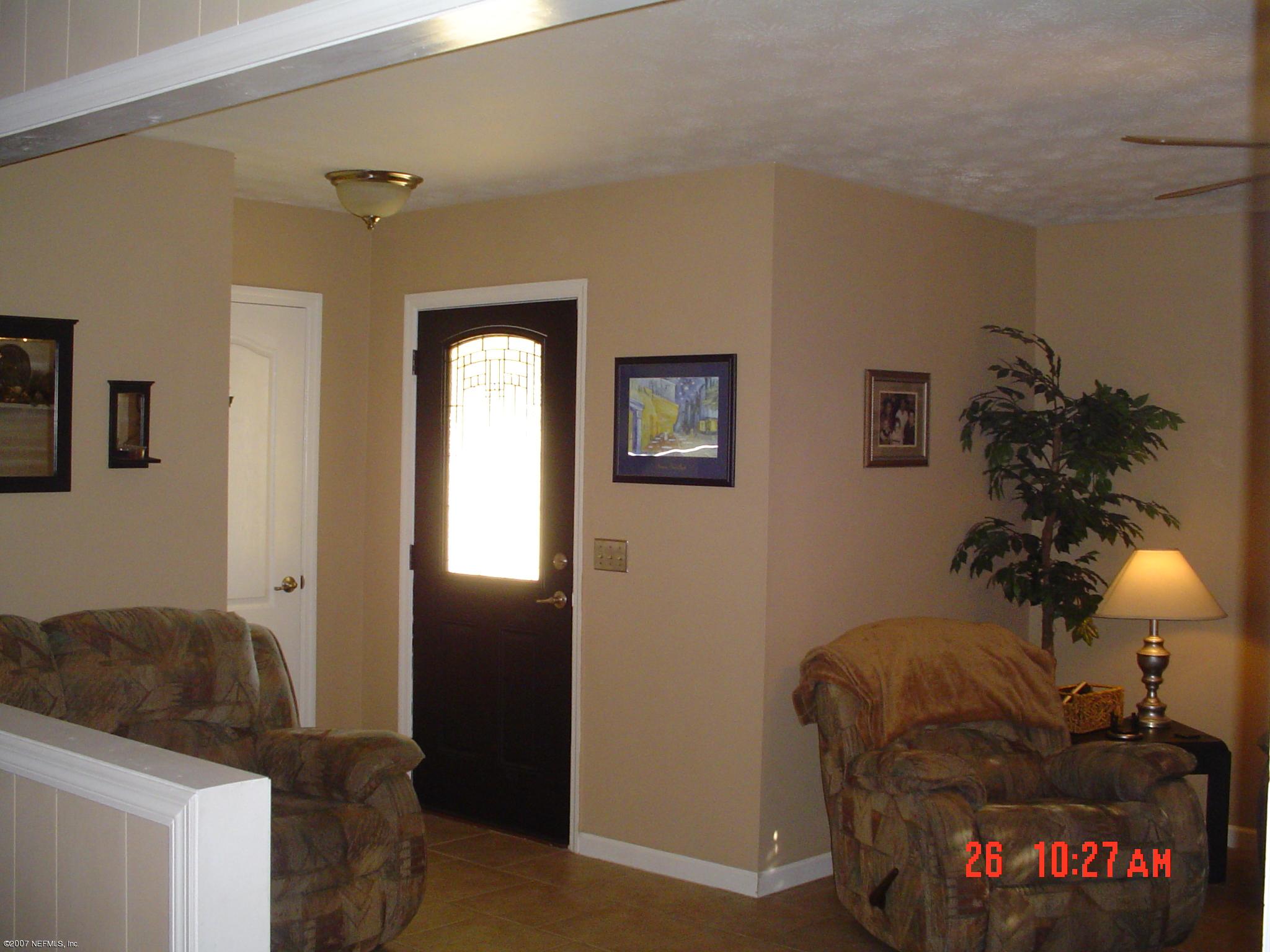13308 Lanier Road Jacksonville, FL 32226 - Photo 9 of 29 living room, with entry