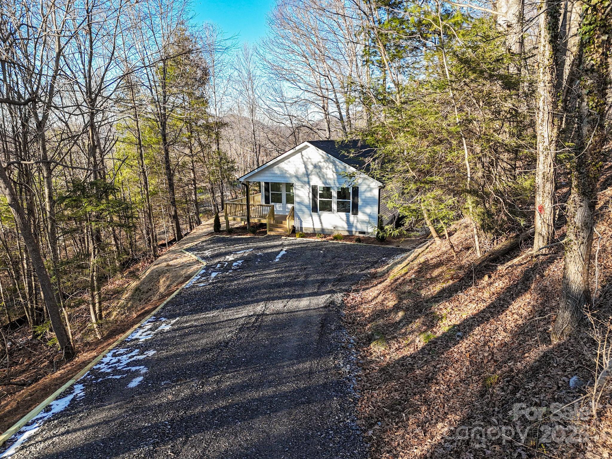 330 Peaceful Lane Clyde, NC 28721 - Photo 3 of 39 a front view of a house with a yard