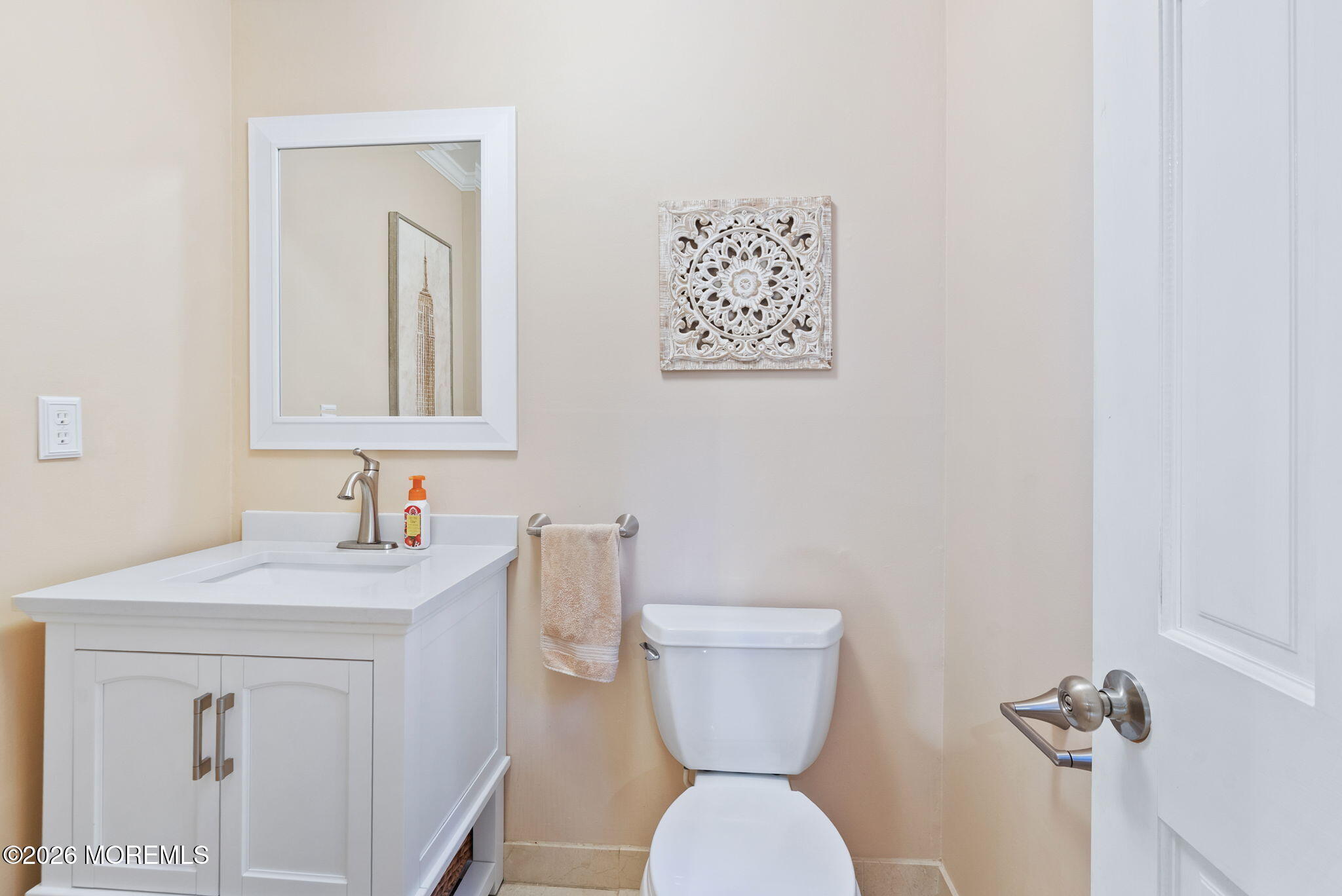 21 Stoney Brook Road Holmdel, NJ 07733 - Photo 14 of 40 a bathroom with a toilet sink and mirror