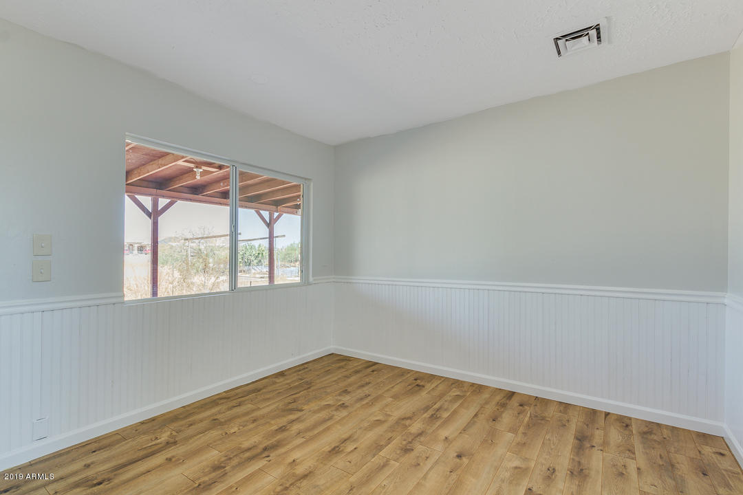 20632 West Telegram Path Road Buckeye, AZ 85326 - Photo 12 of 23 an empty room with a window