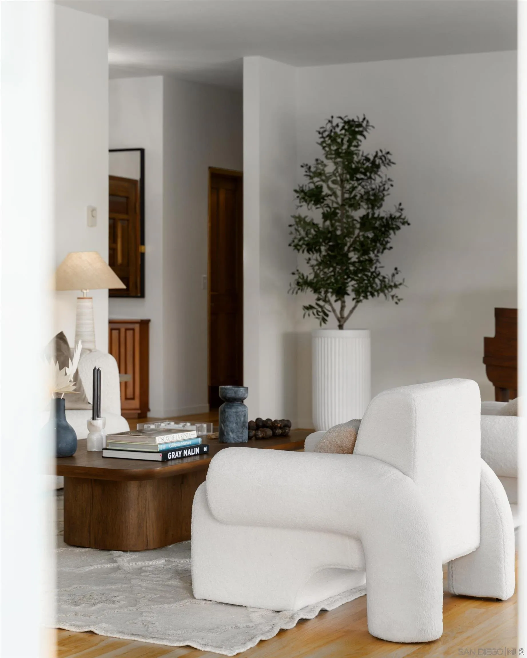 16059 Puerta Del Sol Rancho Santa Fe, CA 92067 - Photo 12 of 25 a living room with furniture and a potted plant