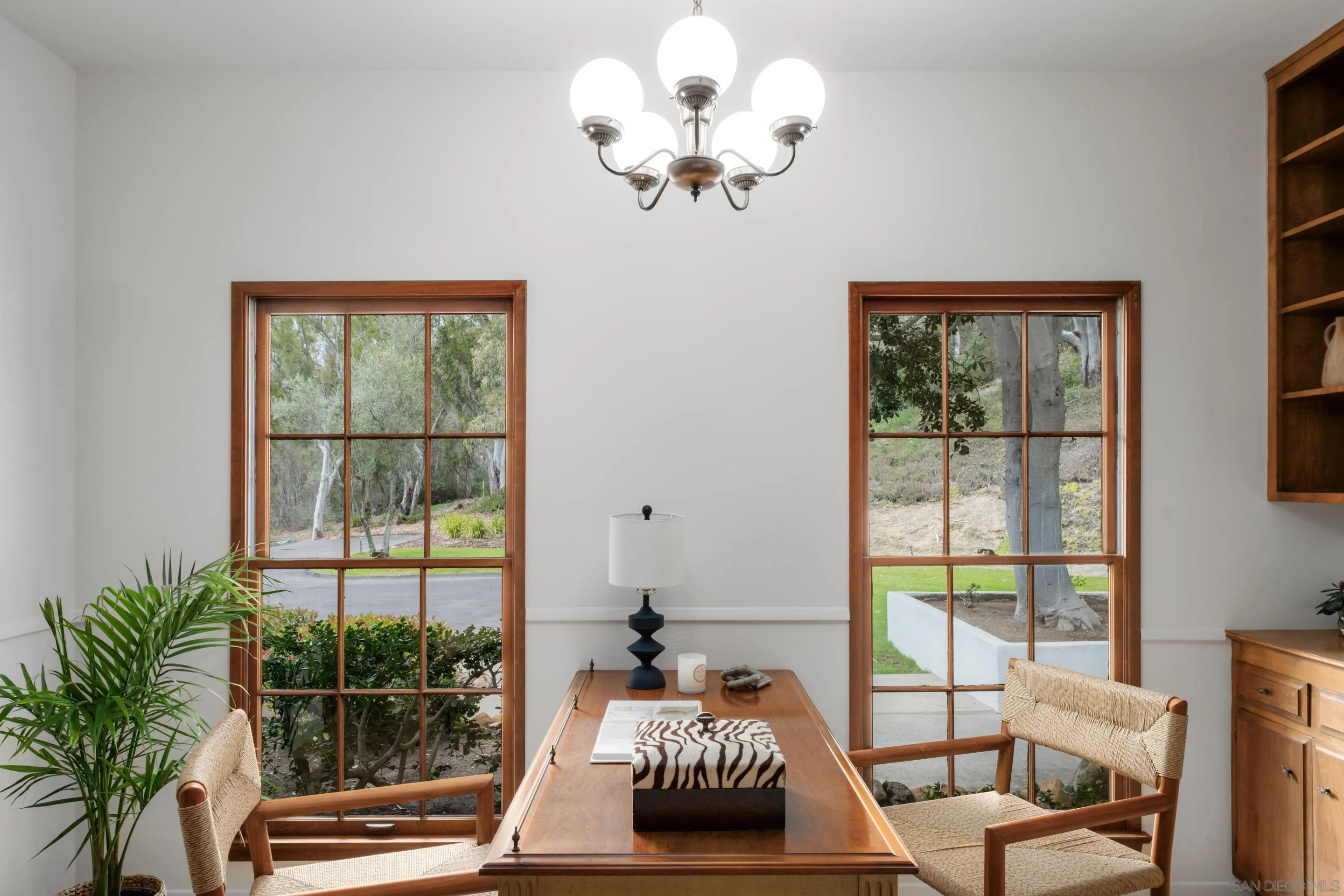 16059 Puerta Del Sol Rancho Santa Fe, CA 92067 - Photo 13 of 25 a living room with furniture and a large window
