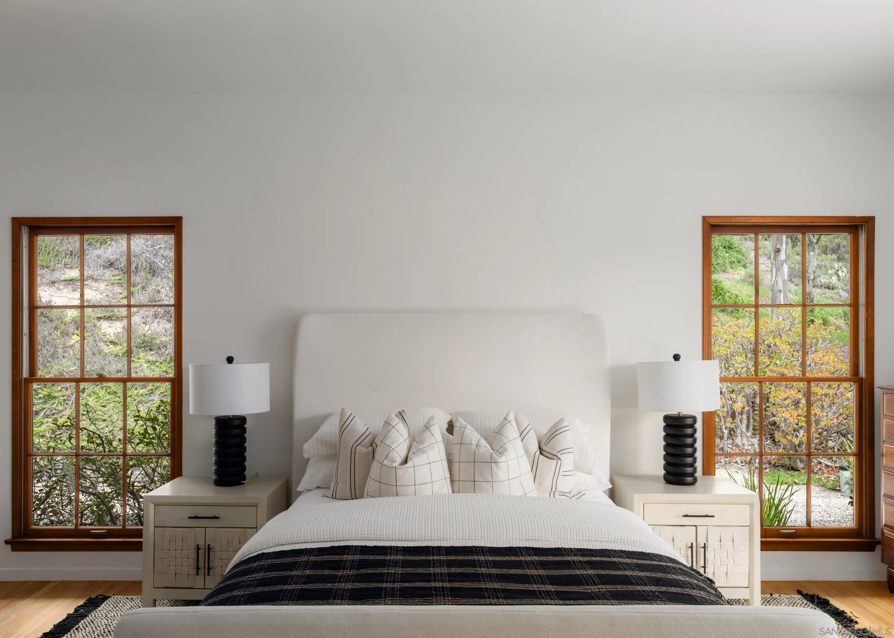 16059 Puerta Del Sol Rancho Santa Fe, CA 92067 - Photo 15 of 25 a bedroom with a bed and wooden floor