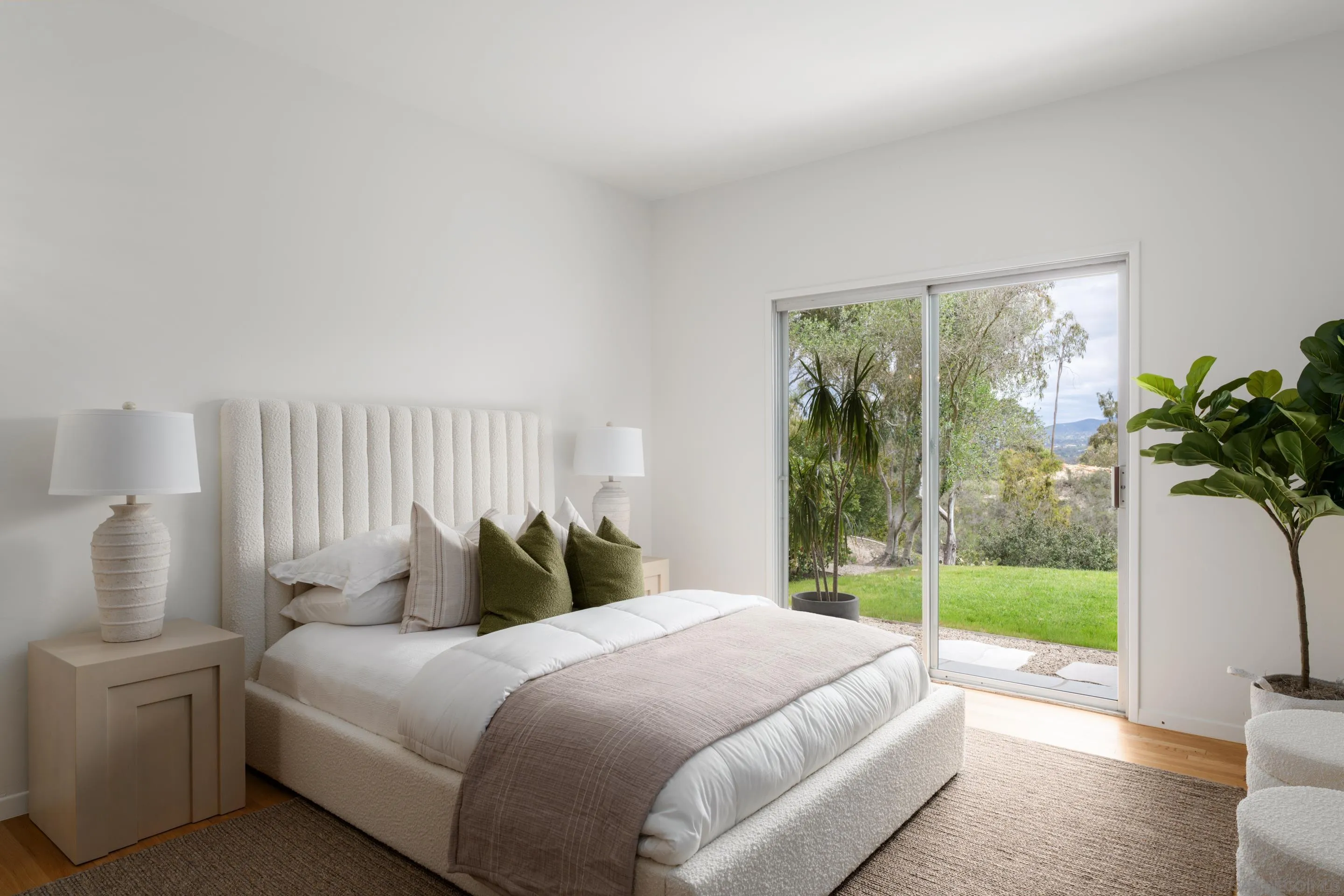 16059 Puerta Del Sol Rancho Santa Fe, CA 92067 - Photo 17 of 25 a bedroom with bed and a large window