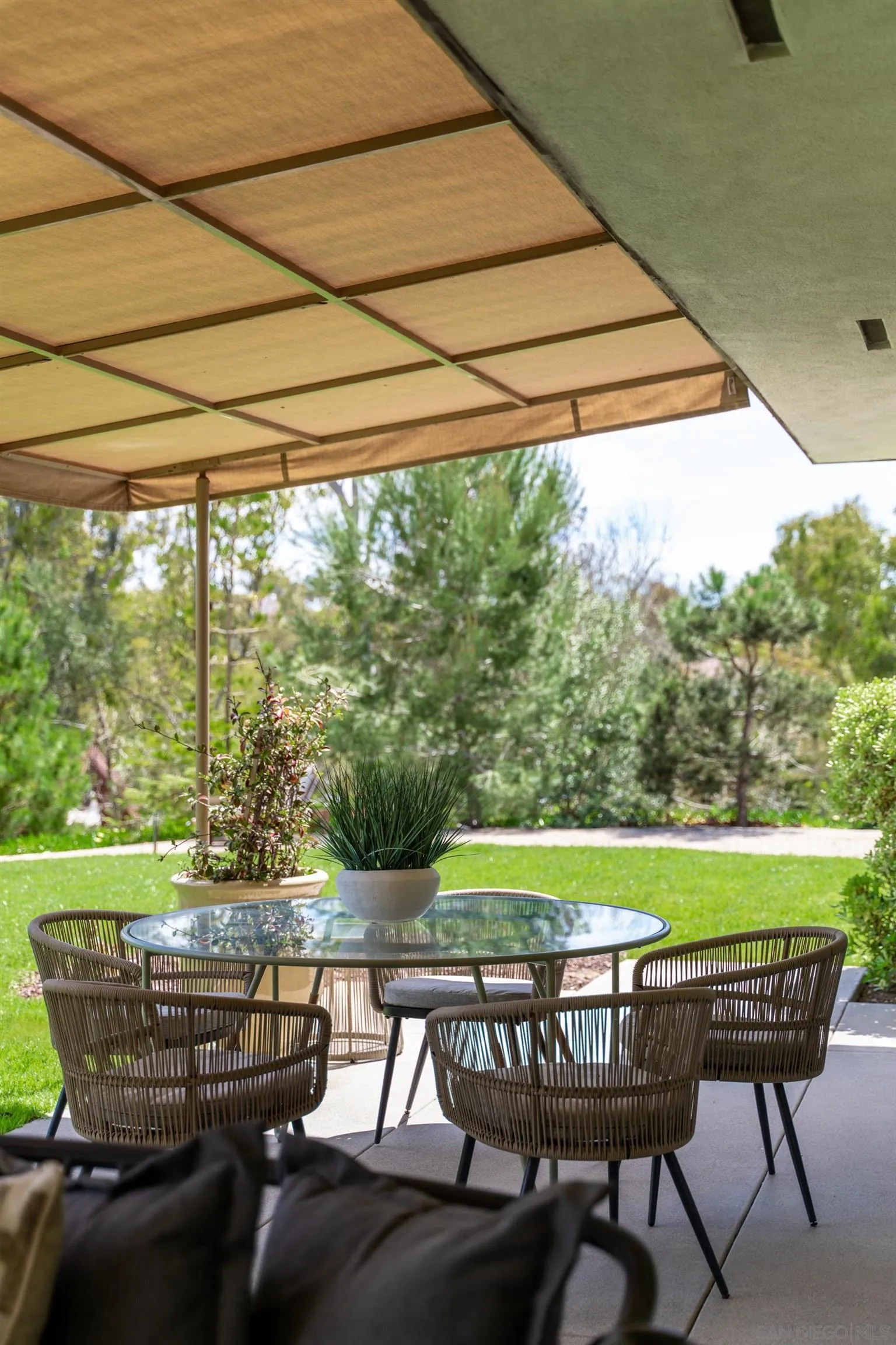16059 Puerta Del Sol Rancho Santa Fe, CA 92067 - Photo 18 of 25 a patio with water view fountain and a lawn chairs