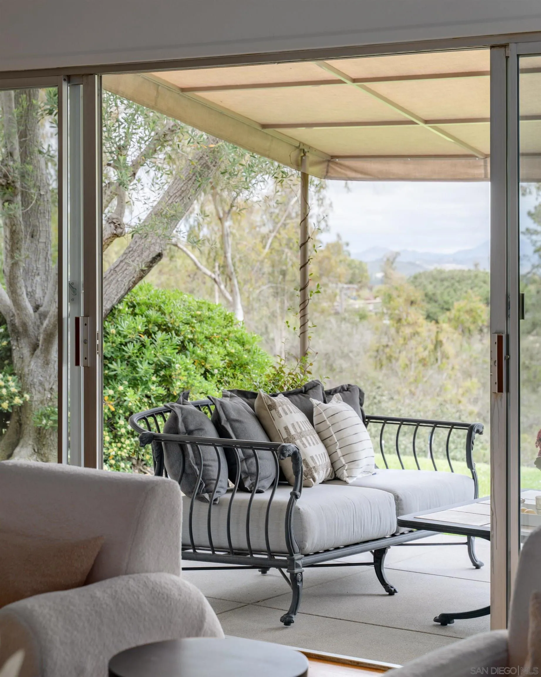 16059 Puerta Del Sol Rancho Santa Fe, CA 92067 - Photo 19 of 25 a living room with furniture and a window