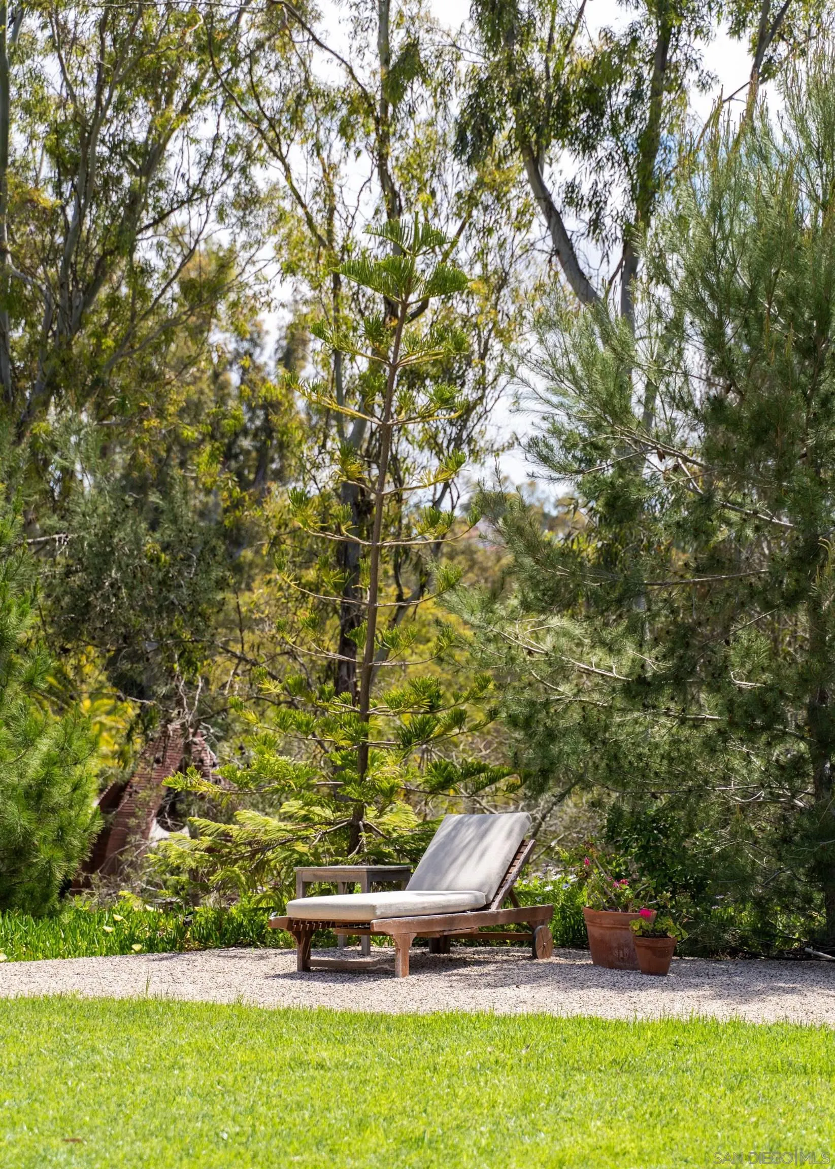 16059 Puerta Del Sol Rancho Santa Fe, CA 92067 - Photo 20 of 25 a backyard of a house with lots of green space