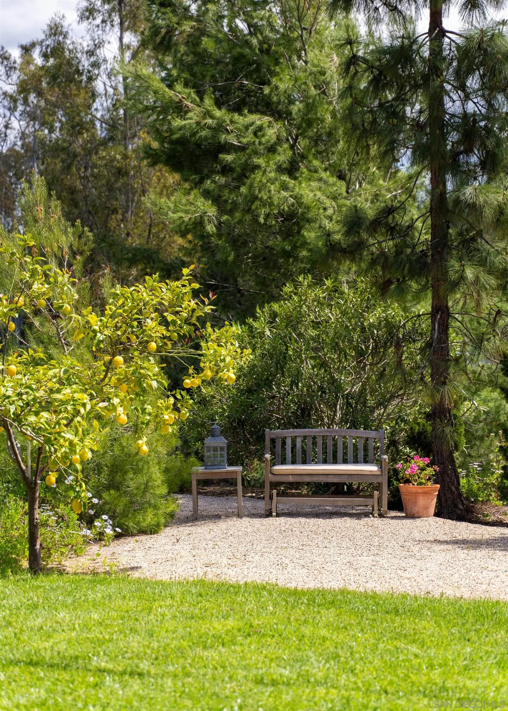 16059 Puerta Del Sol Rancho Santa Fe, CA 92067 - Photo 21 of 25 a view of backyard with seating area