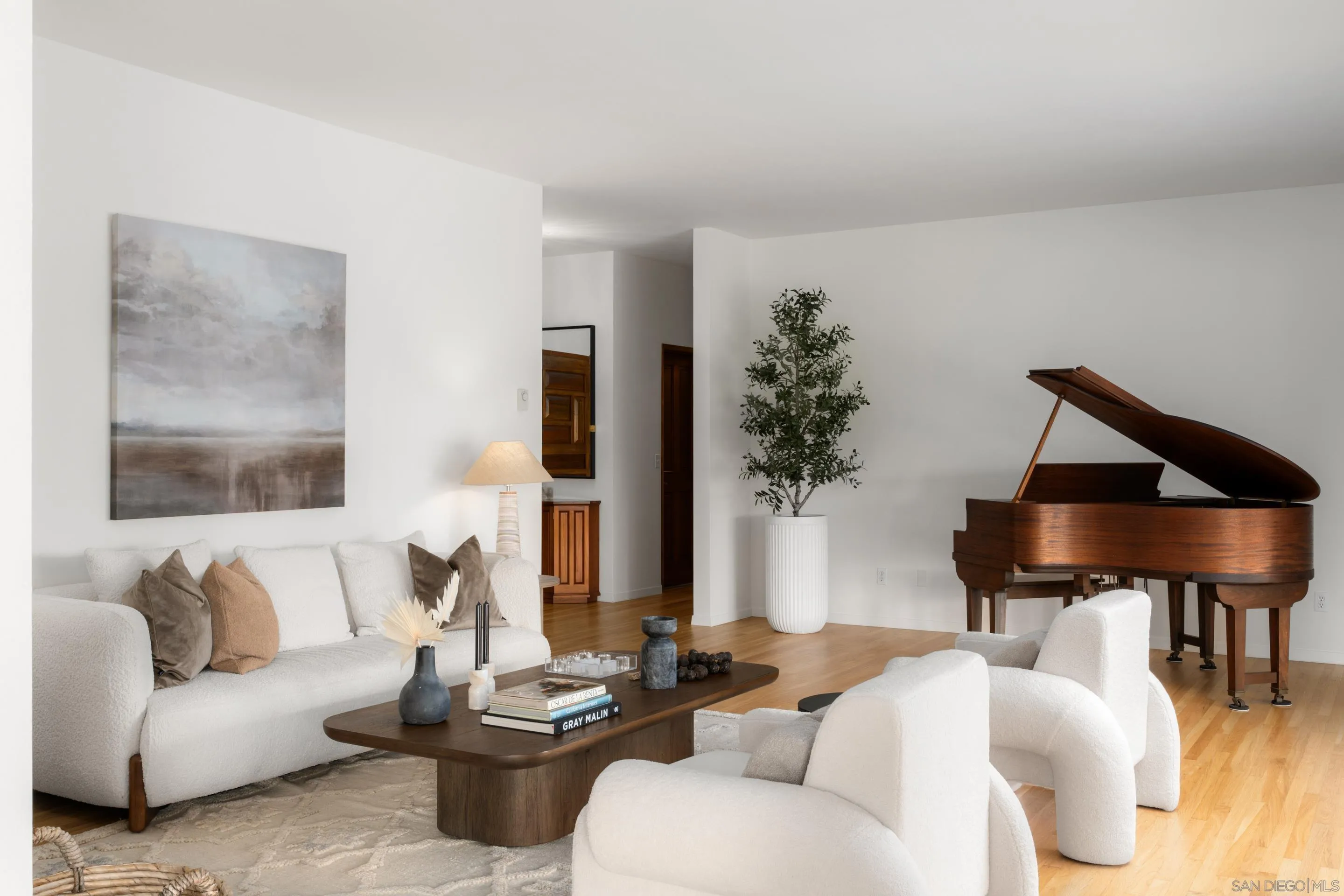 16059 Puerta Del Sol Rancho Santa Fe, CA 92067 - Photo 7 of 25 a living room with furniture and a potted plant
