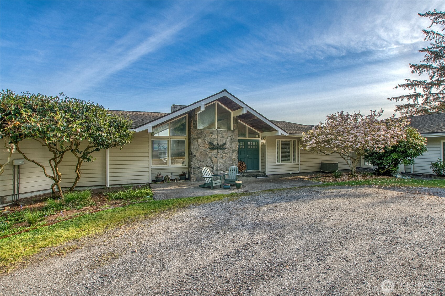 664 Tidewinds Lane Orcas Island, WA 98245 - Photo 12 of 35 a front view of a house with a yard