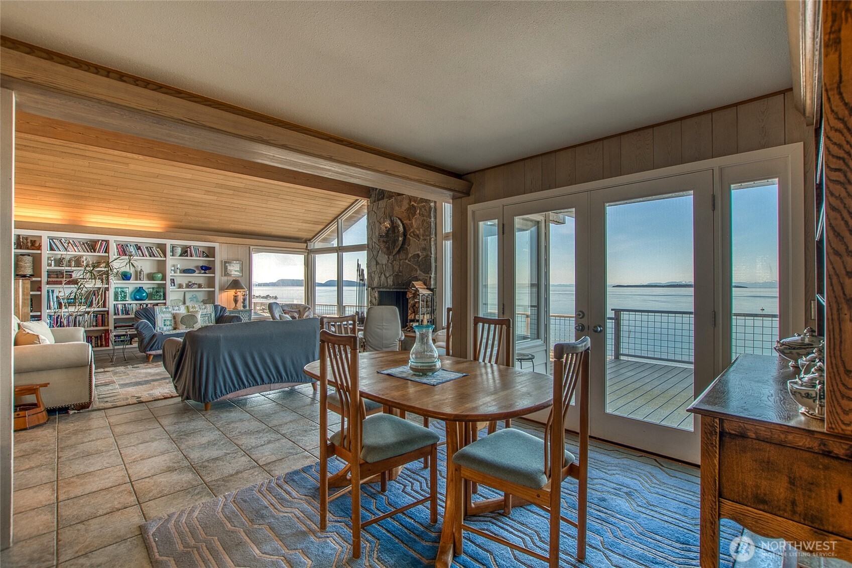 664 Tidewinds Lane Orcas Island, WA 98245 - Photo 15 of 35 a living room with furniture and a large window