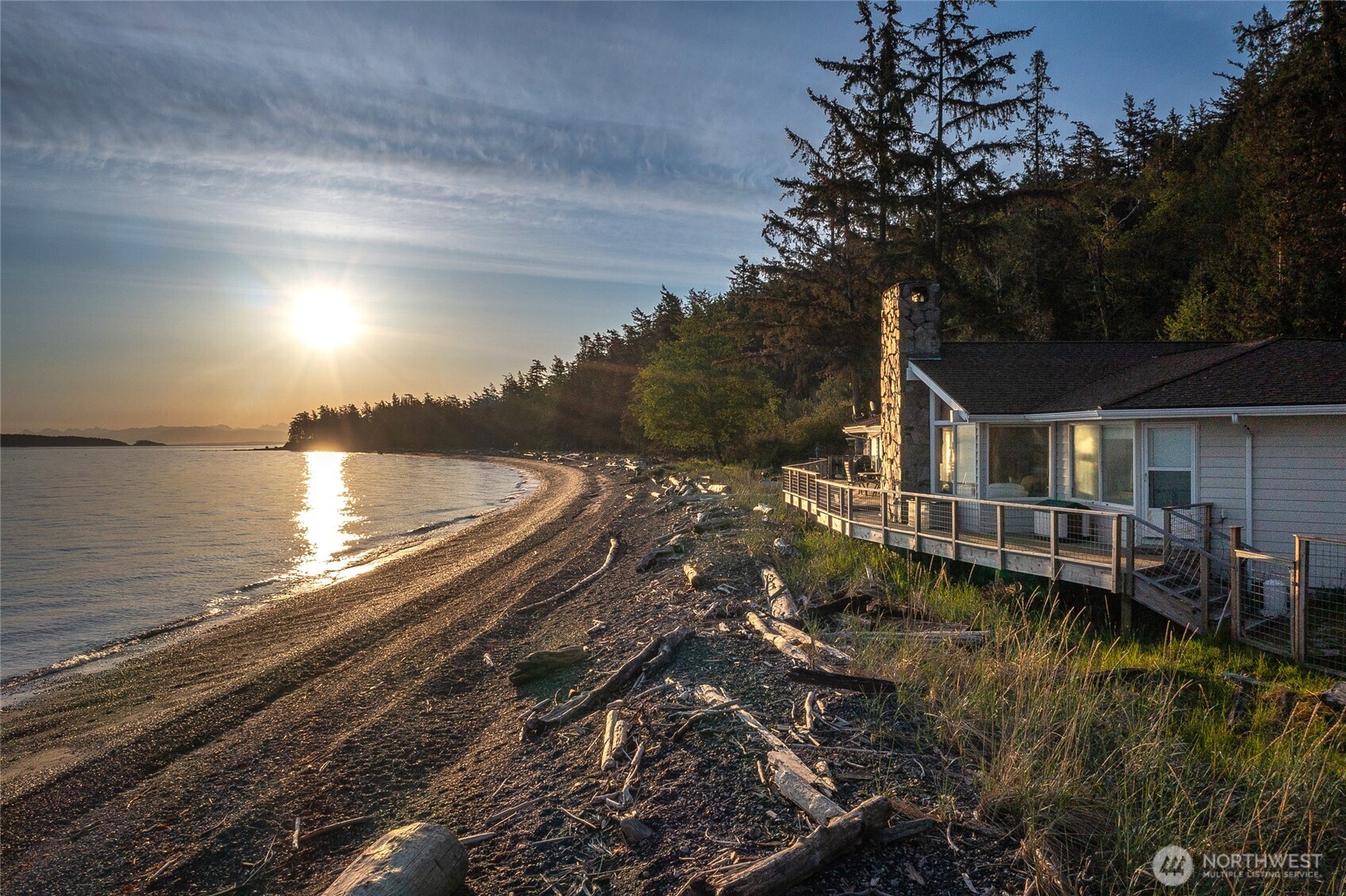 664 Tidewinds Lane Orcas Island, WA 98245 - Photo 2 of 35 a view of a lake with a house