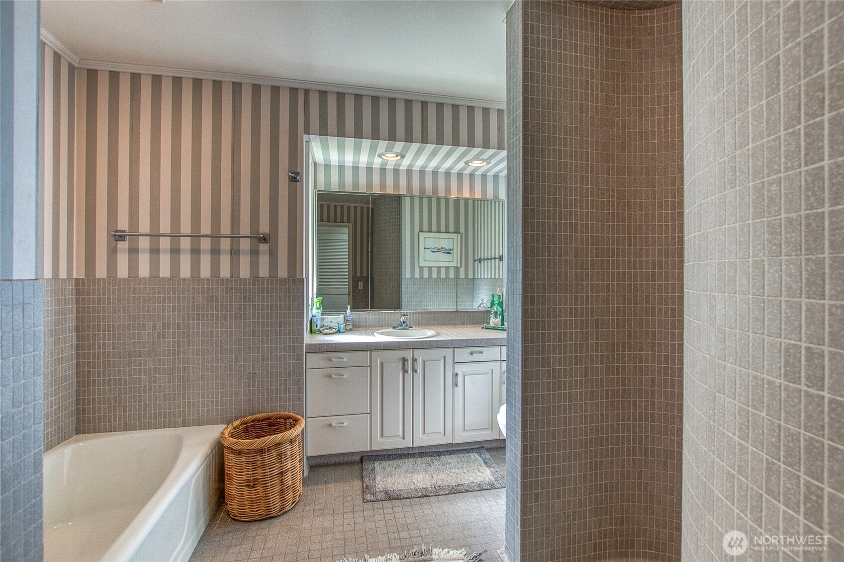 664 Tidewinds Lane Orcas Island, WA 98245 - Photo 21 of 35 a bathroom with a tub shower and sink