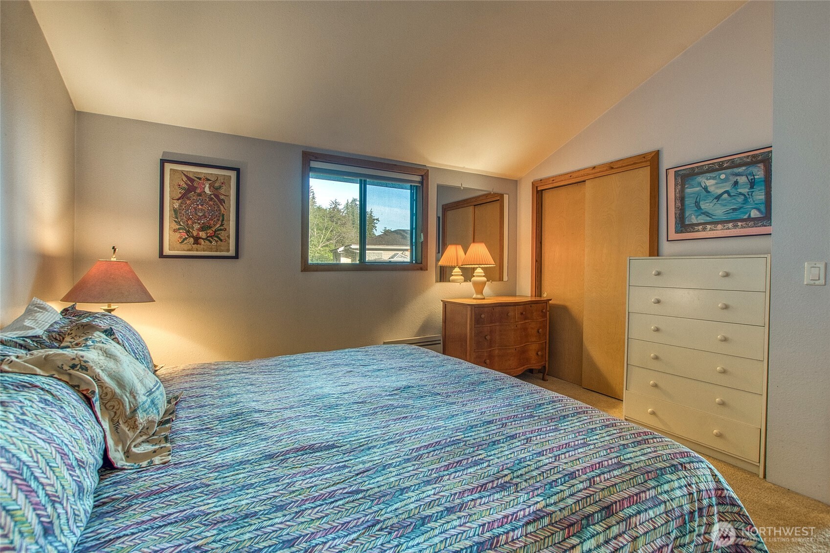 664 Tidewinds Lane Orcas Island, WA 98245 - Photo 25 of 35 a bedroom with a bed and a dresser