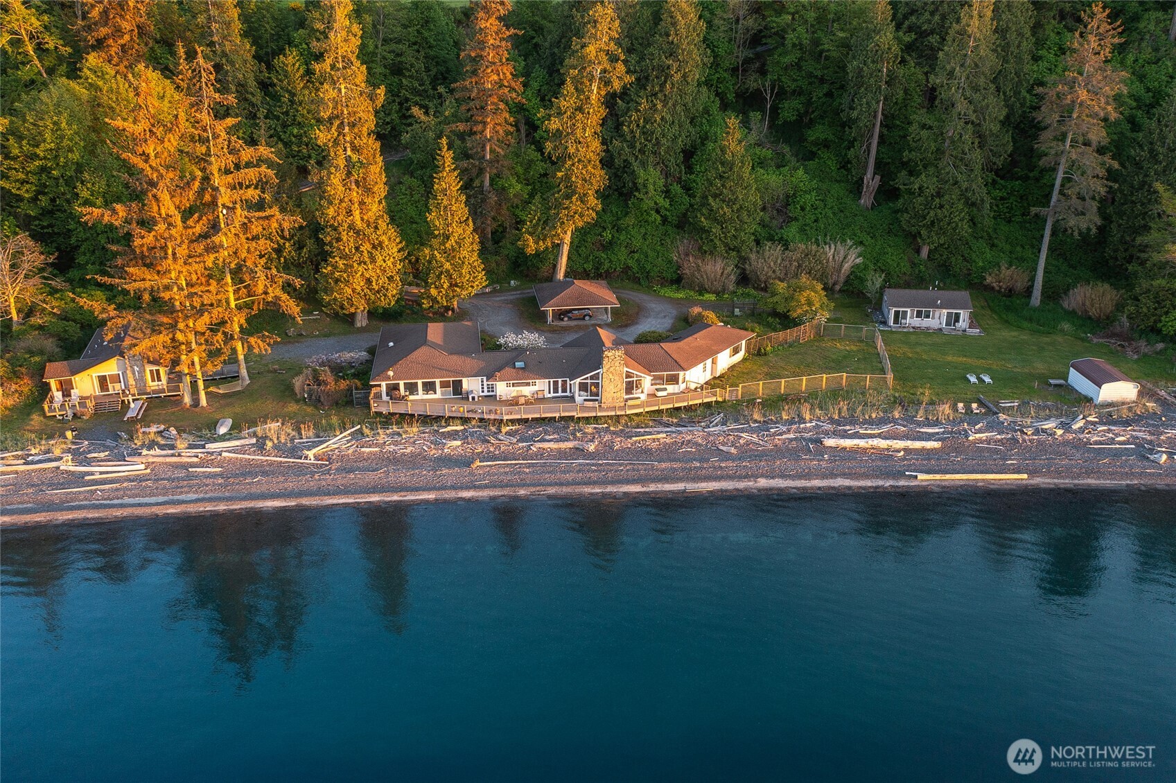 664 Tidewinds Lane Orcas Island, WA 98245 - Photo 3 of 35 a view of a lake from a yard