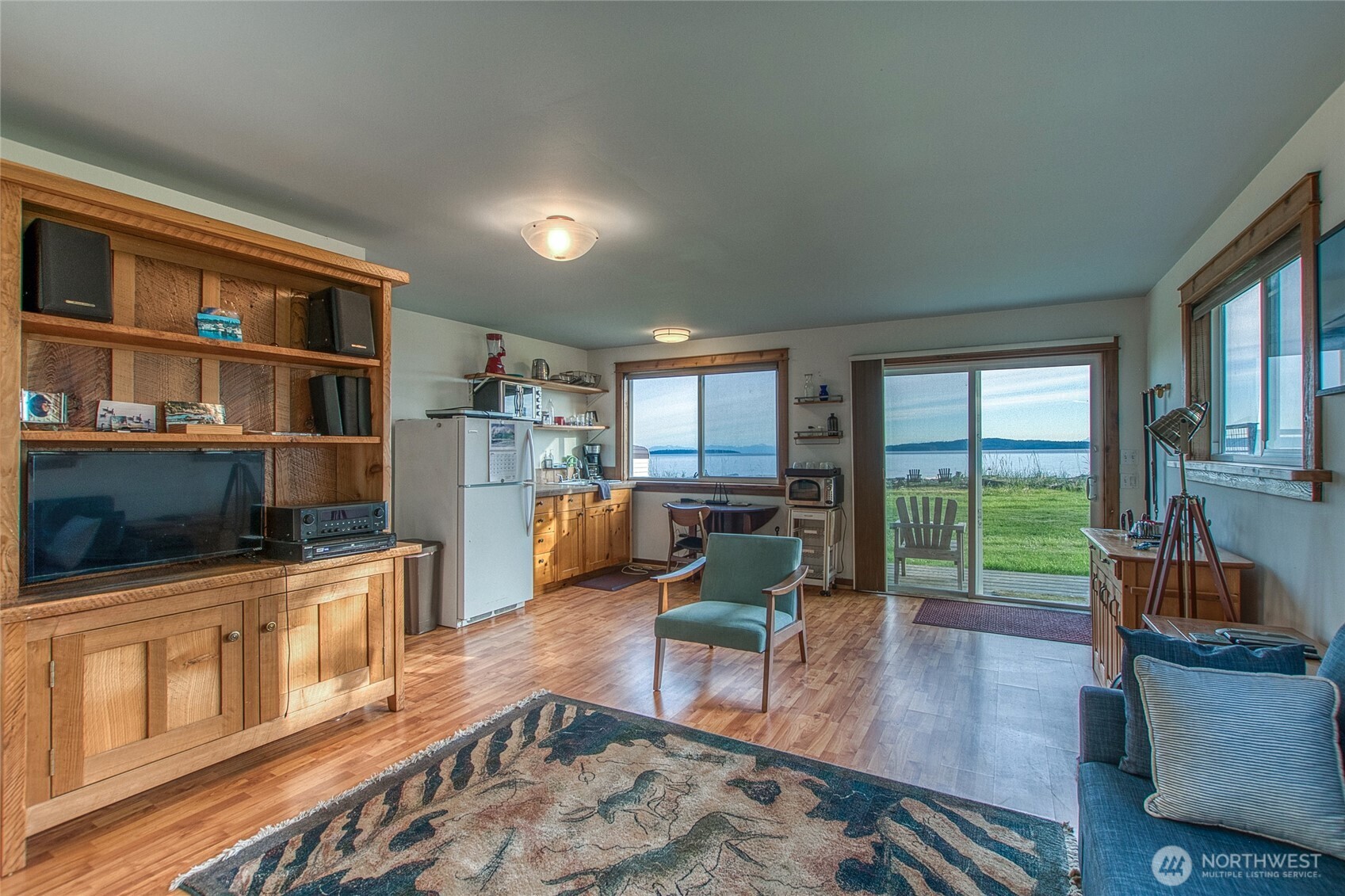 664 Tidewinds Lane Orcas Island, WA 98245 - Photo 31 of 35 a living room with furniture and a flat screen tv