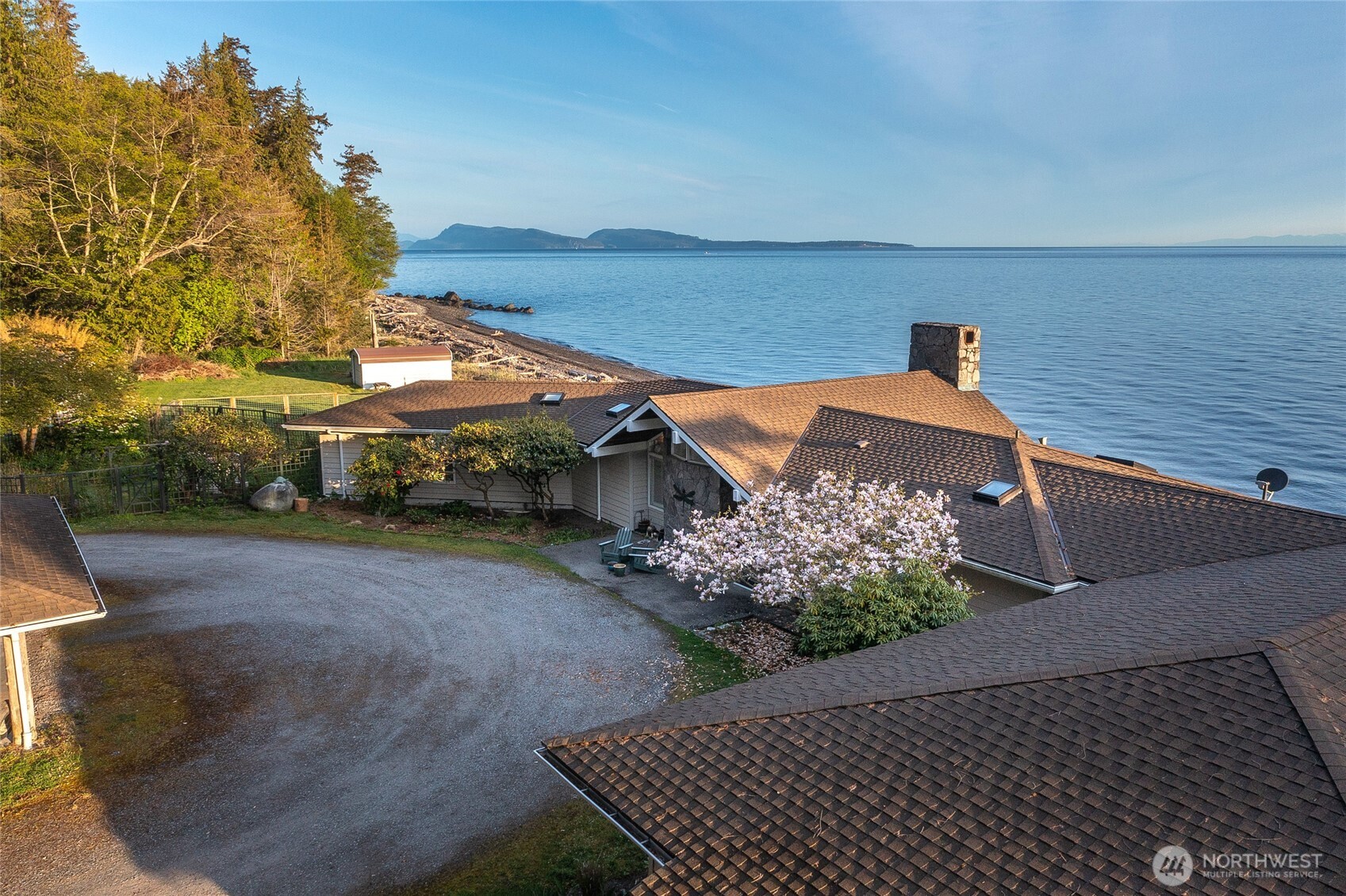 664 Tidewinds Lane Orcas Island, WA 98245 - Photo 5 of 35 a view of a house with a yard