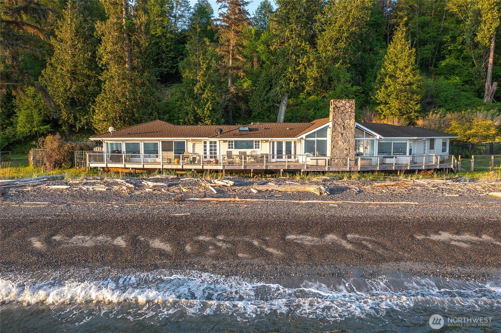 664 Tidewinds Lane Orcas Island, WA 98245 - Photo 7 of 35 a front view of a house with a yard and balcony