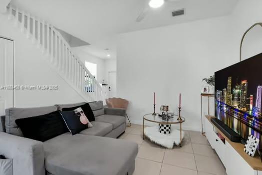 11852 Southwest 245 Terrace Homestead, FL 33032 - Photo 11 of 31 a living room with furniture and a book shelf