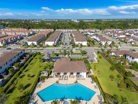11852 Southwest 245 Terrace Homestead, FL 33032 - Photo 27 of 31 an aerial view of residential houses with outdoor space and trees