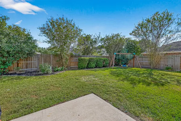 a view of a backyard with a garden