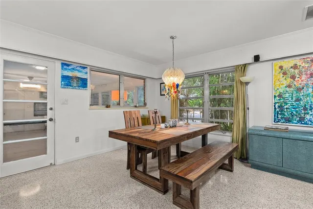 a view of a livingroom with furniture window and wooden floor