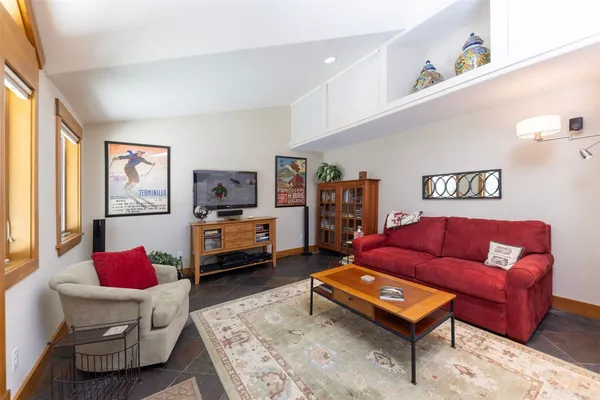 a living room with furniture and a couch