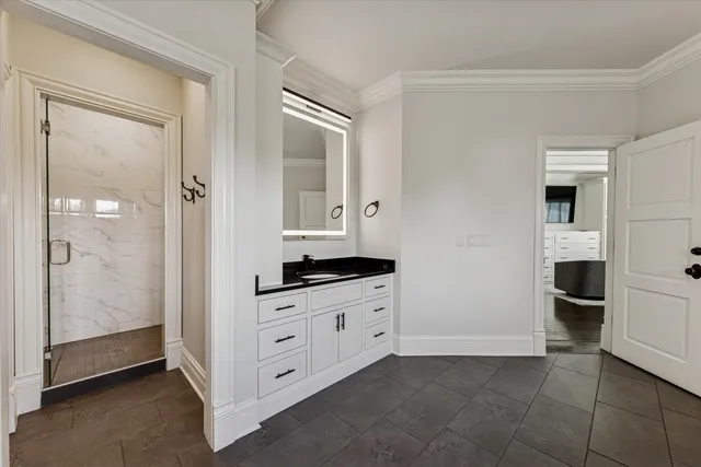 a kitchen with a stove and a refrigerator