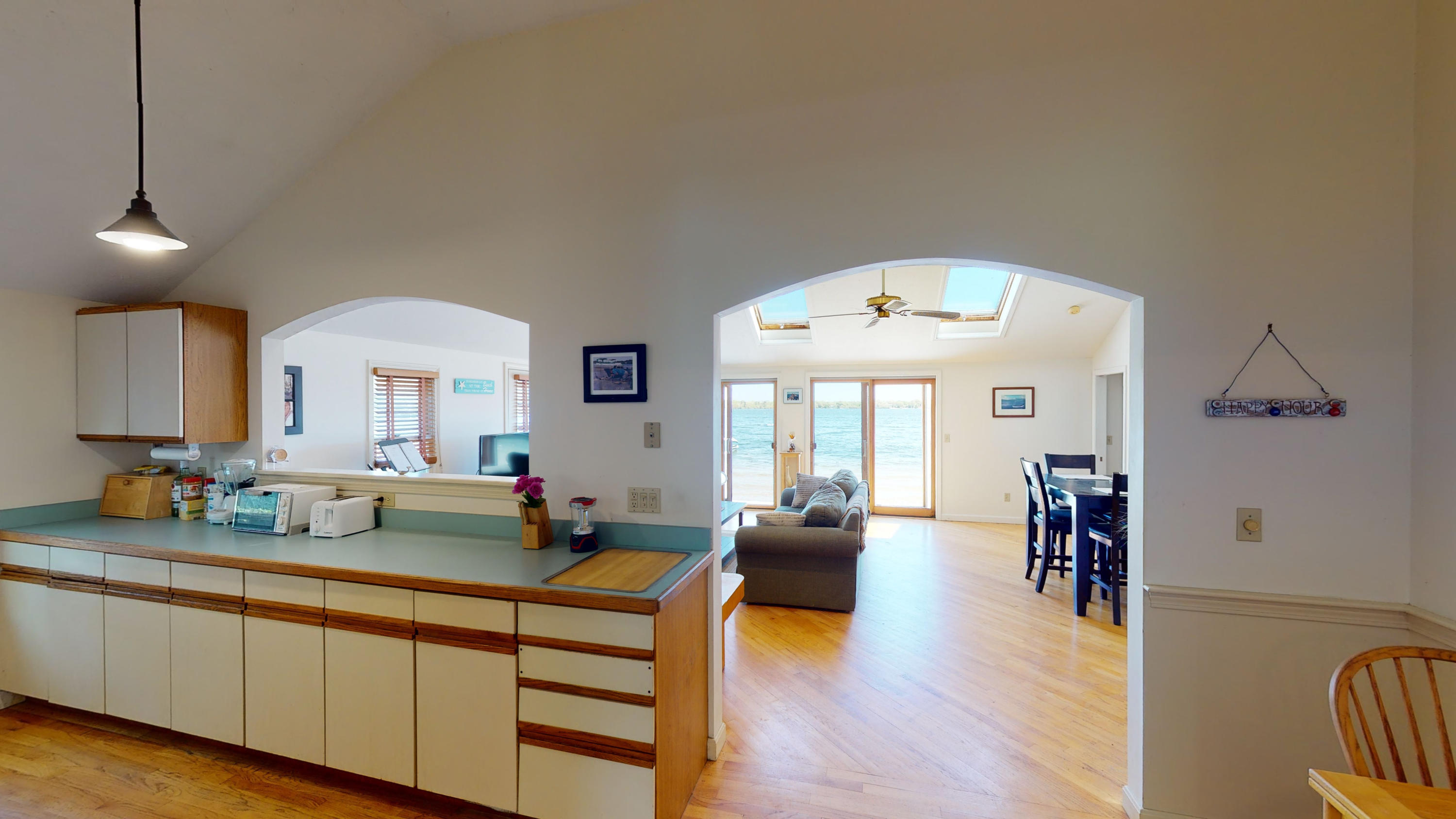 110 Annable Point Road Centerville, MA 02632 - Photo 15 of 27 a living room with furniture and wooden floor