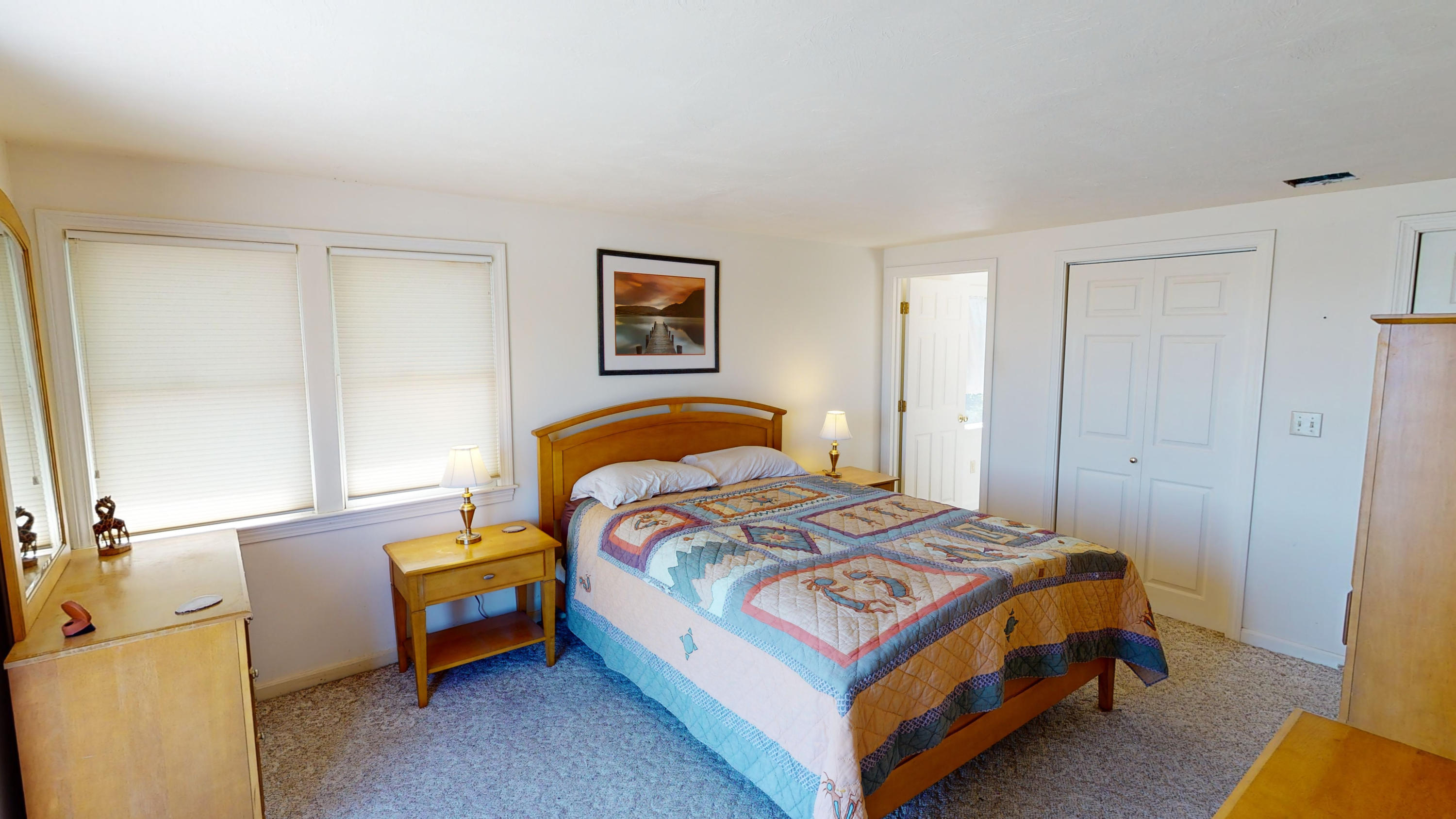 110 Annable Point Road Centerville, MA 02632 - Photo 18 of 27 a bedroom with a bed and a table