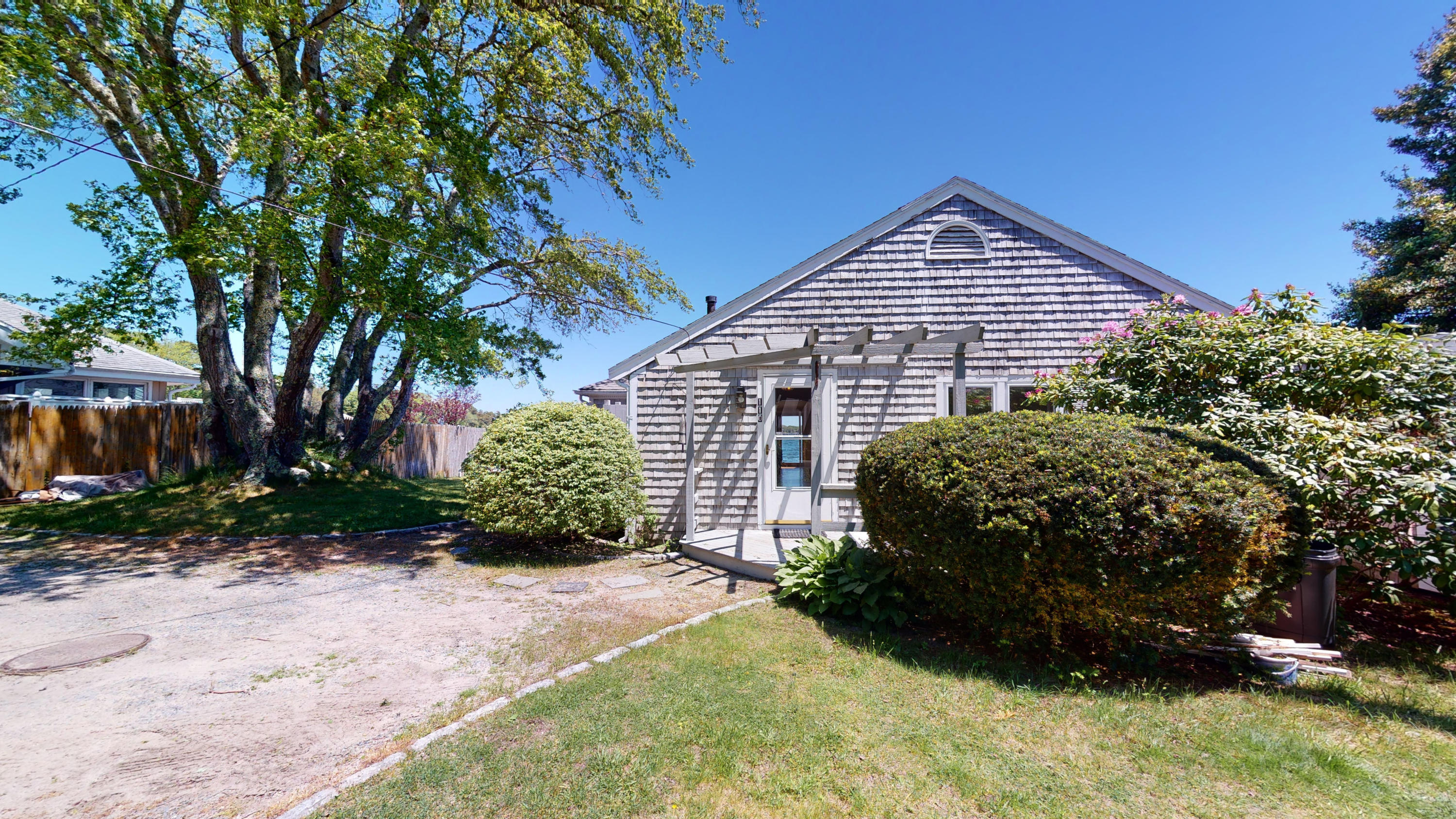 110 Annable Point Road Centerville, MA 02632 - Photo 10 of 27 a view of a house with a garden