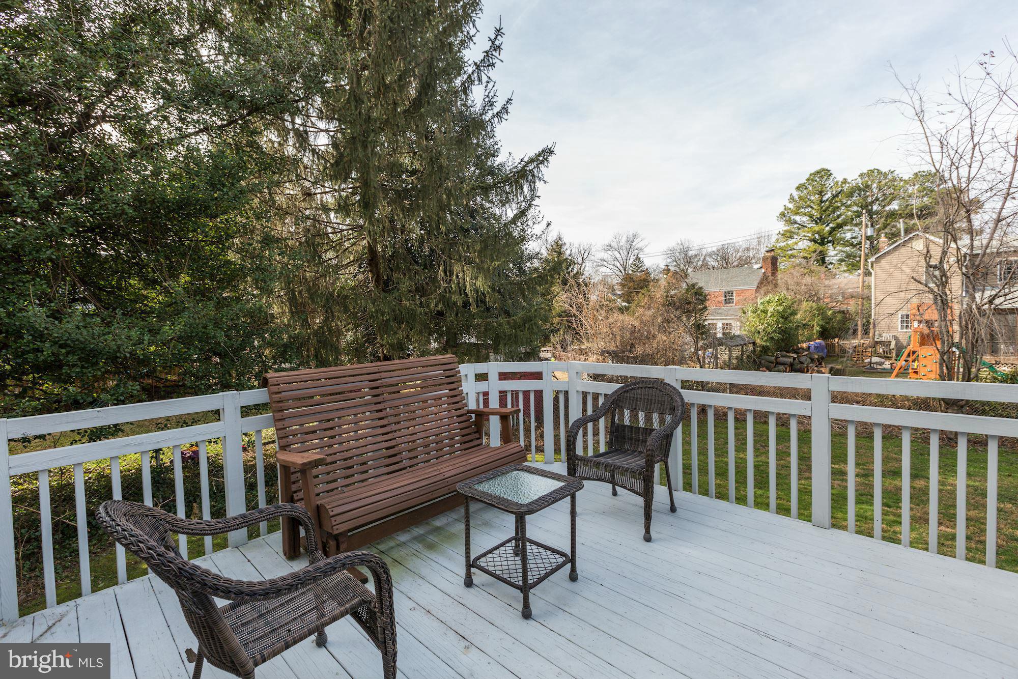 10002 Rogart Road Silver Spring, MD 20901 - Photo 24 of 28 a view of a two chairs in the deck