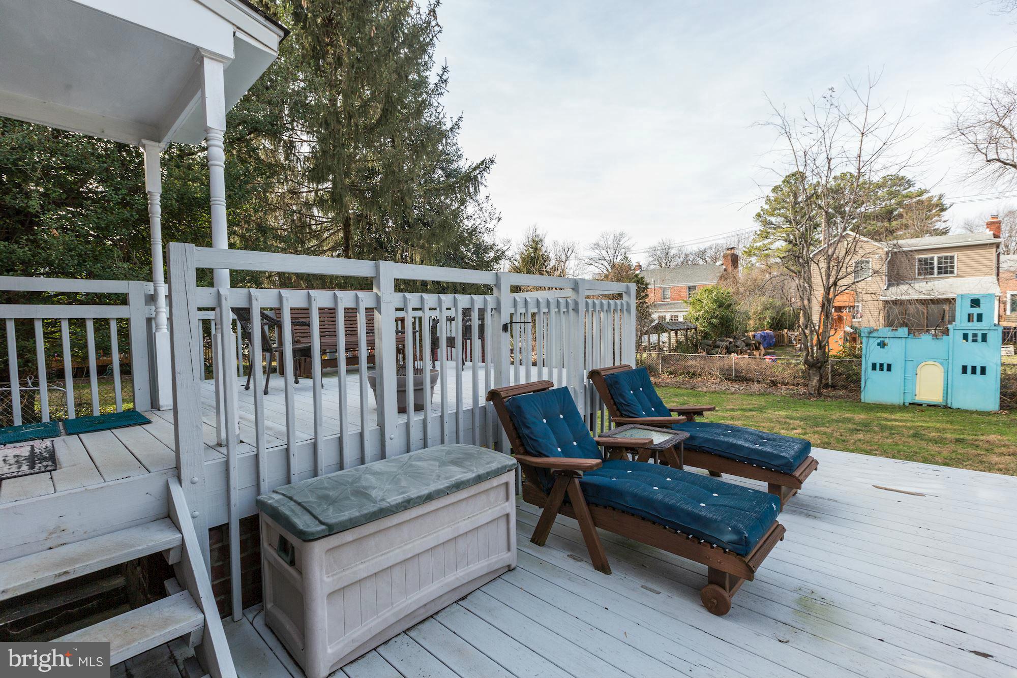 10002 Rogart Road Silver Spring, MD 20901 - Photo 25 of 28 a view of a bench in wooden deck