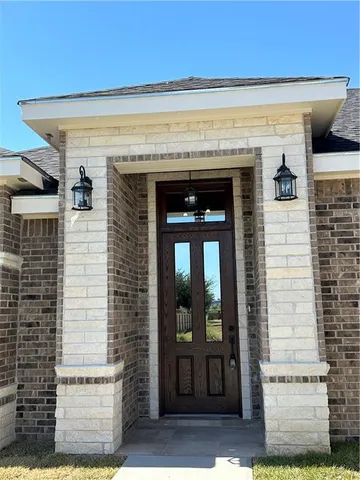 a front view of a building with glass door