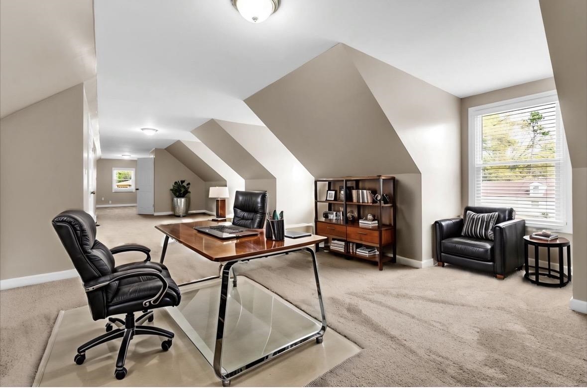 1649 Babs Road Memphis, TN 38116 - Photo 15 of 20 a living room with furniture a fireplace and a large window