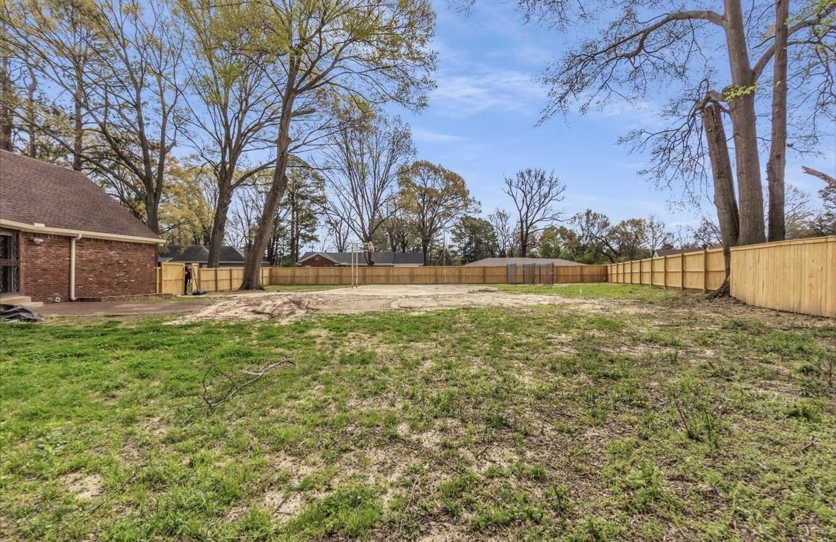 1649 Babs Road Memphis, TN 38116 - Photo 20 of 20 a view of lawn with large tree