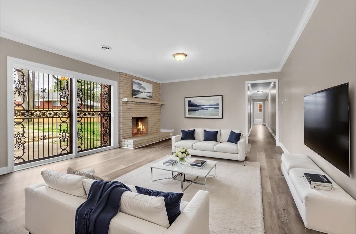 1649 Babs Road Memphis, TN 38116 - Photo 9 of 20 a living room with furniture large window and a flat screen tv