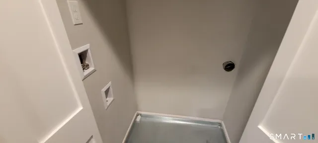 a view of an empty walk in closet