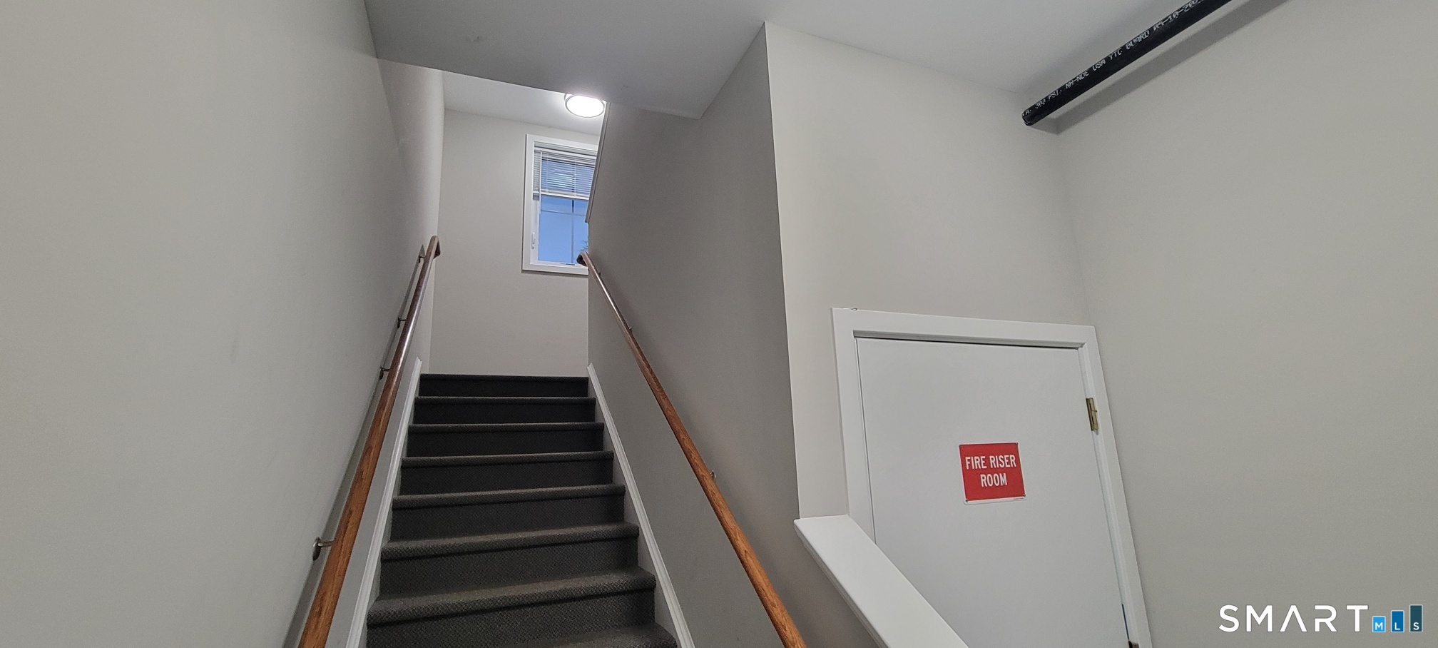 155 Greenwood Avenue, Unit B202 Bethel, CT 06801 - Photo 4 of 14 Stairs to 2nd flr
