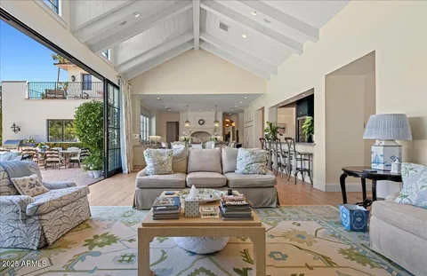 a living room with furniture and a table