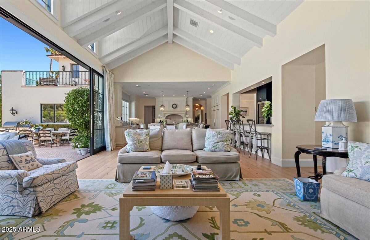 5446 East Exeter Boulevard Phoenix, AZ 85018 - Photo 11 of 59 a living room with furniture and a table