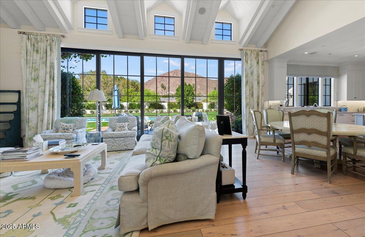 5446 East Exeter Boulevard Phoenix, AZ 85018 - Photo 14 of 59 a living room with furniture and a large window