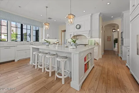 a bathroom with a sink and a window