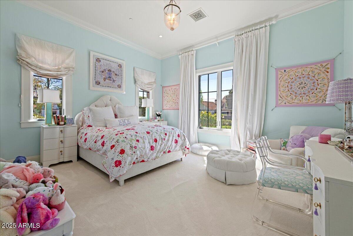 5446 East Exeter Boulevard Phoenix, AZ 85018 - Photo 26 of 59 a bedroom with a bed and a window